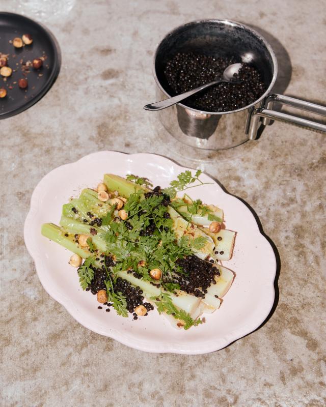 Steamed leeks with beluga lentils, chervil and vinaigrette