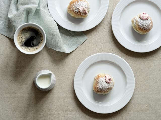 Danish Shrovetide pastry buns with raspberry and lemon